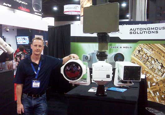 Jason Gratton, Co-Owner and CEO of EyeSite Surveillance, Inc., at a technology trade show.